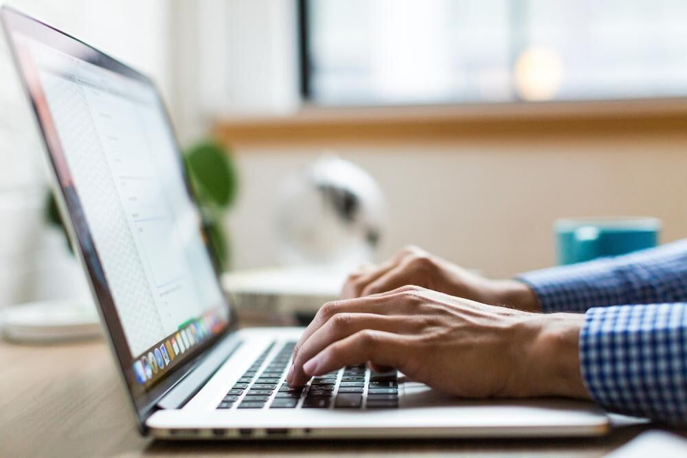 Person working on a laptop